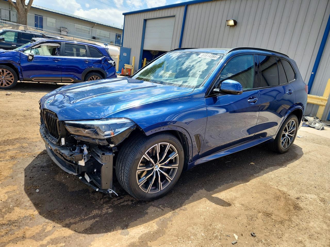 2022 BMW X5 VIN 5UXCR6C0XN9M37040 photo 1