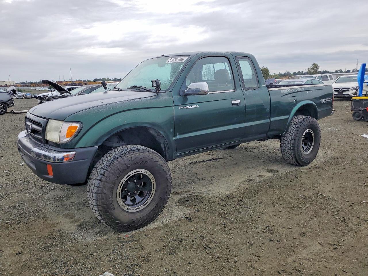 1999 Toyota Tacoma VIN 4TAWN74N1XZ560525 photo 1