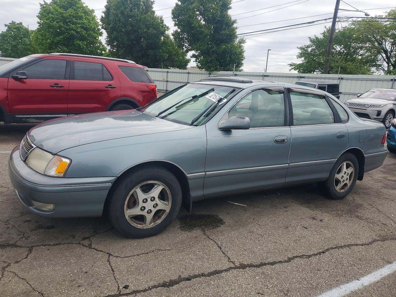 1999 Toyota Avalon VIN 4T1BF18B3XU322312 photo 1