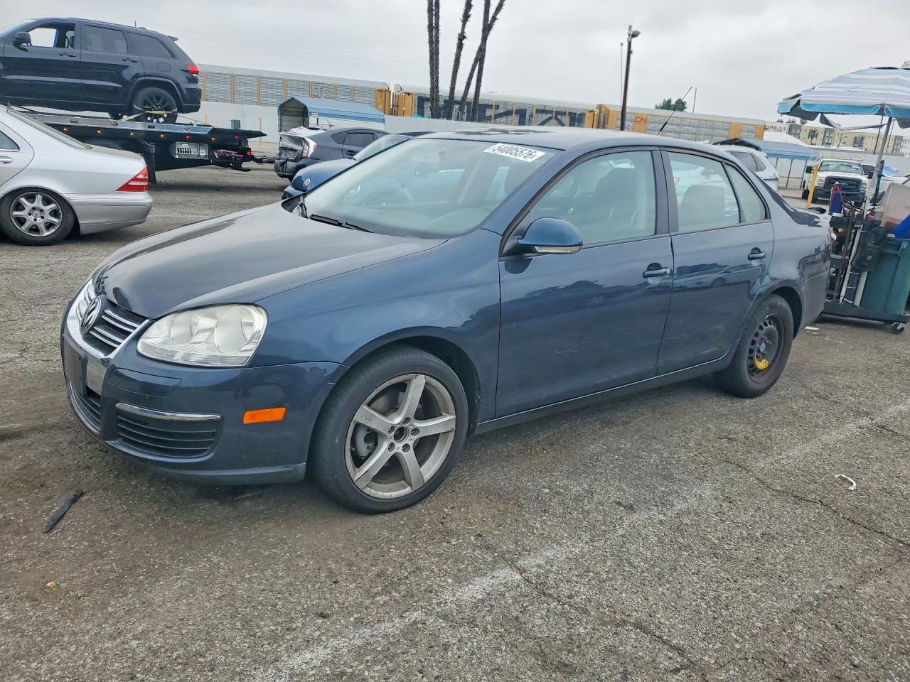 2009 Volkswagen Jetta VIN 3VWJZ71K19M089216 photo 1