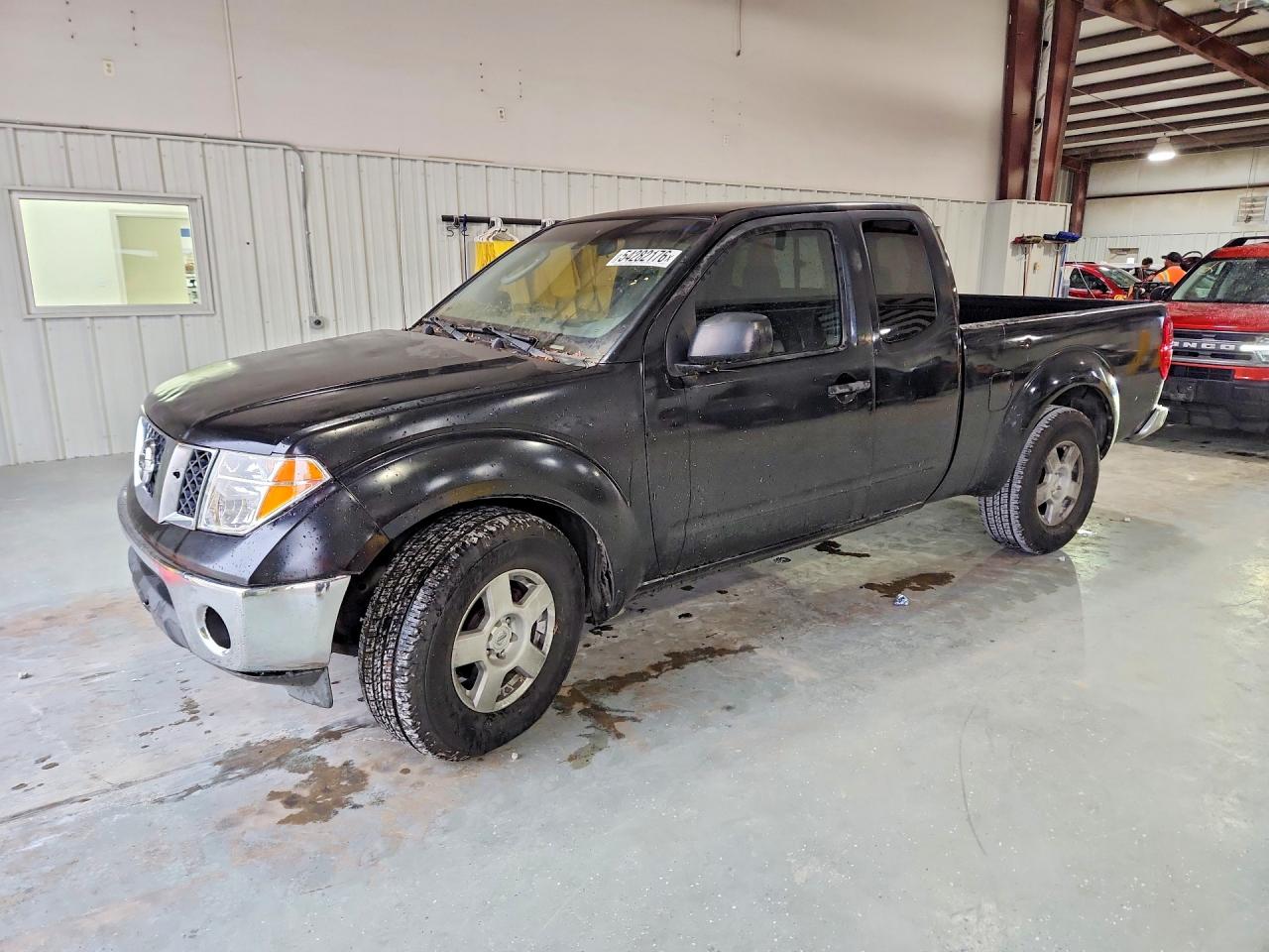 2006 Nissan Frontier VIN 1N6AD06U16C415819 photo 1