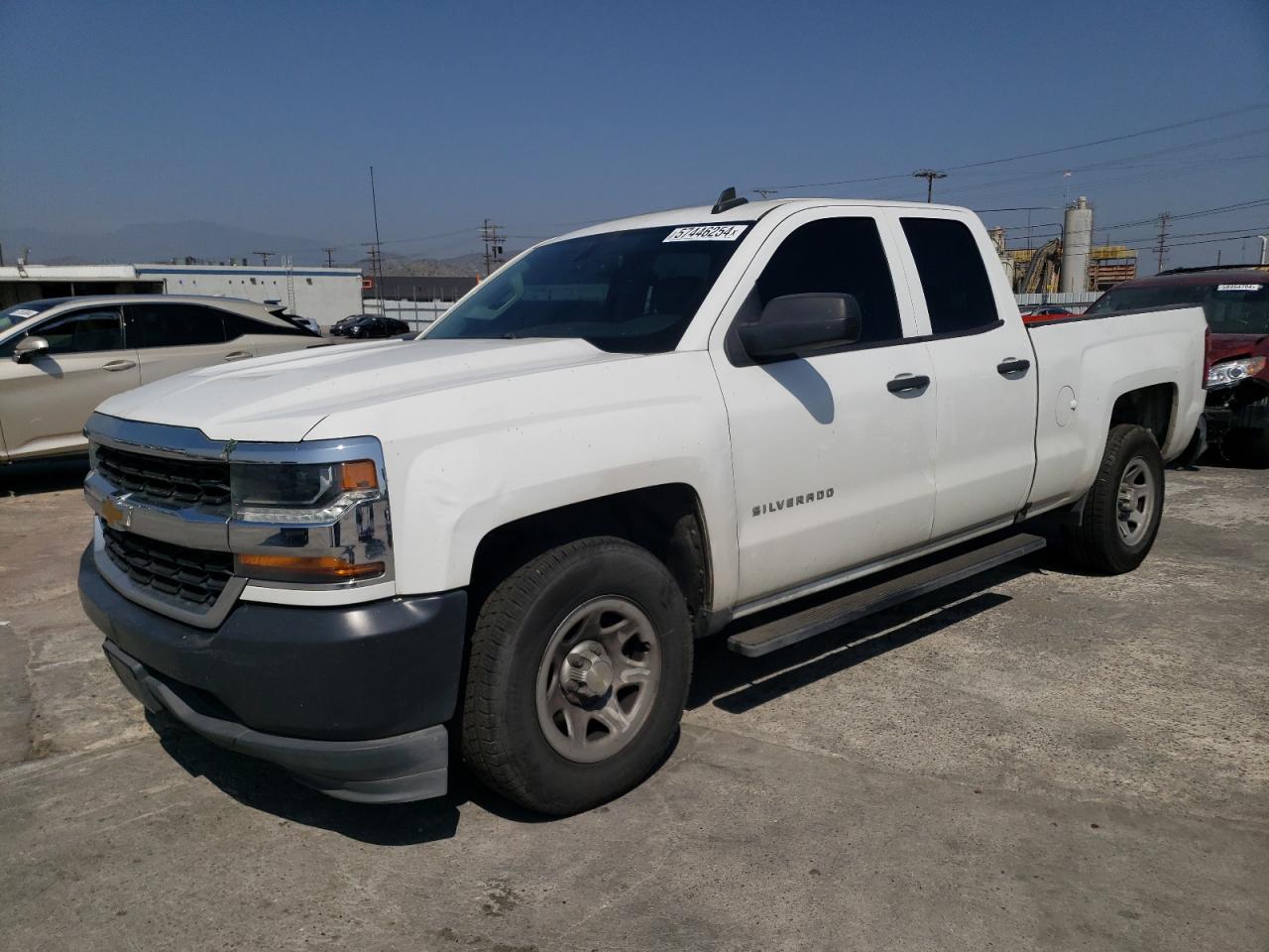 2018 Chevrolet Silverado VIN 1GCRCNEC1JZ215429 photo 1