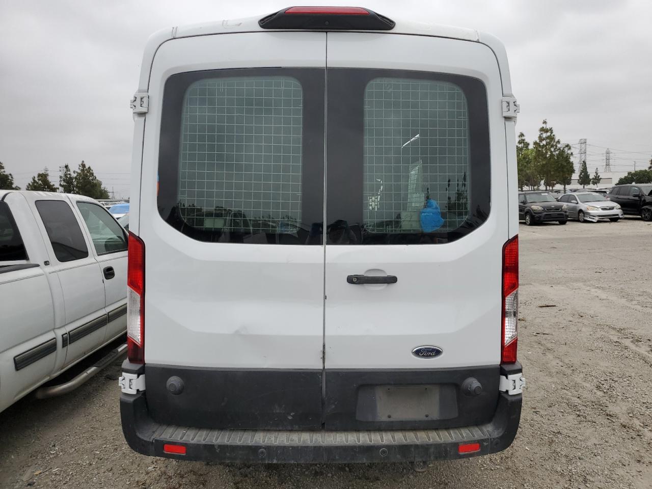 2019 Ford Transit VIN 1FTYR2CM0KKB66562 photo 6