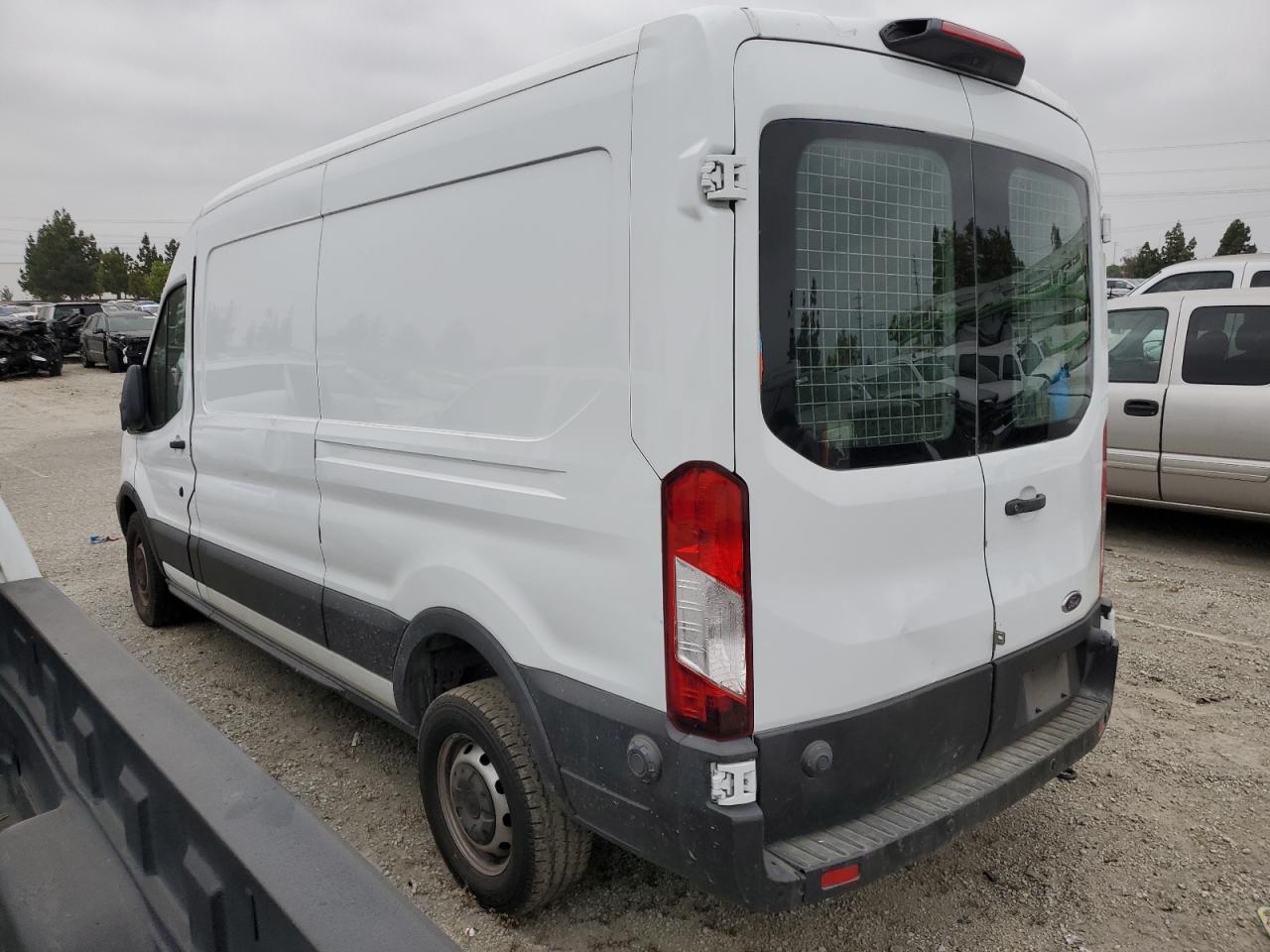 2019 Ford Transit VIN 1FTYR2CM0KKB66562 photo 2