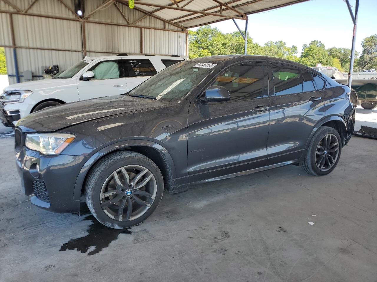 2015 BMW X4 VIN 5UXXW3C58F0M87493 photo 1
