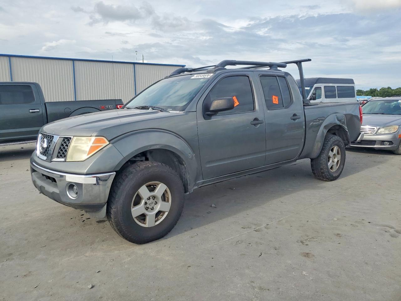 2007 Nissan Frontier VIN 1N6AD09U87C430556 photo 1
