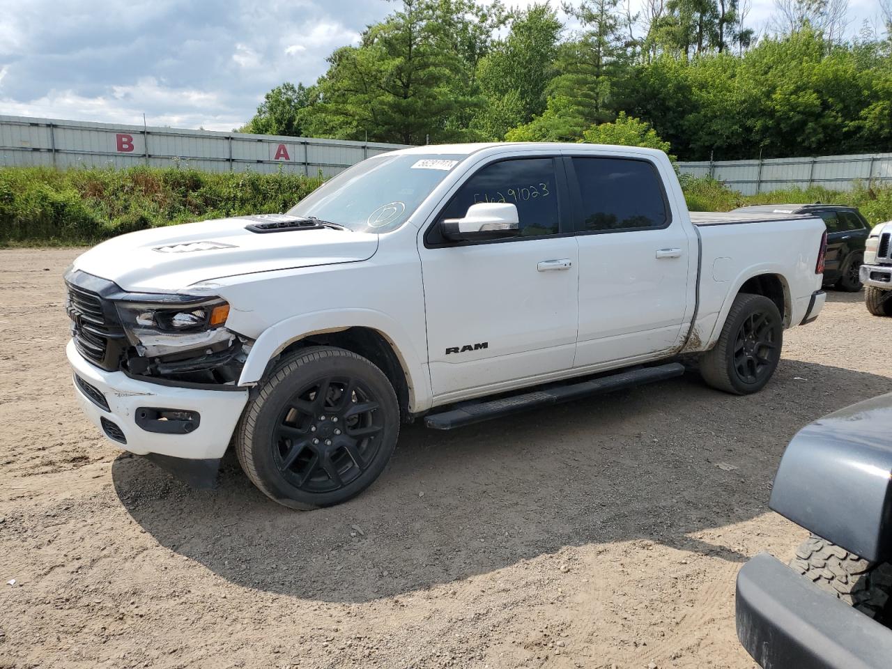 2020 RAM 1500 VIN 1C6SRFJT7LN324121 photo 1