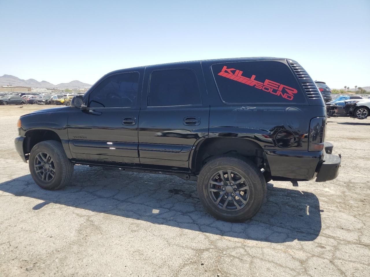 2004 GMC Yukon VIN 1GKEC13V44R246842 photo 2