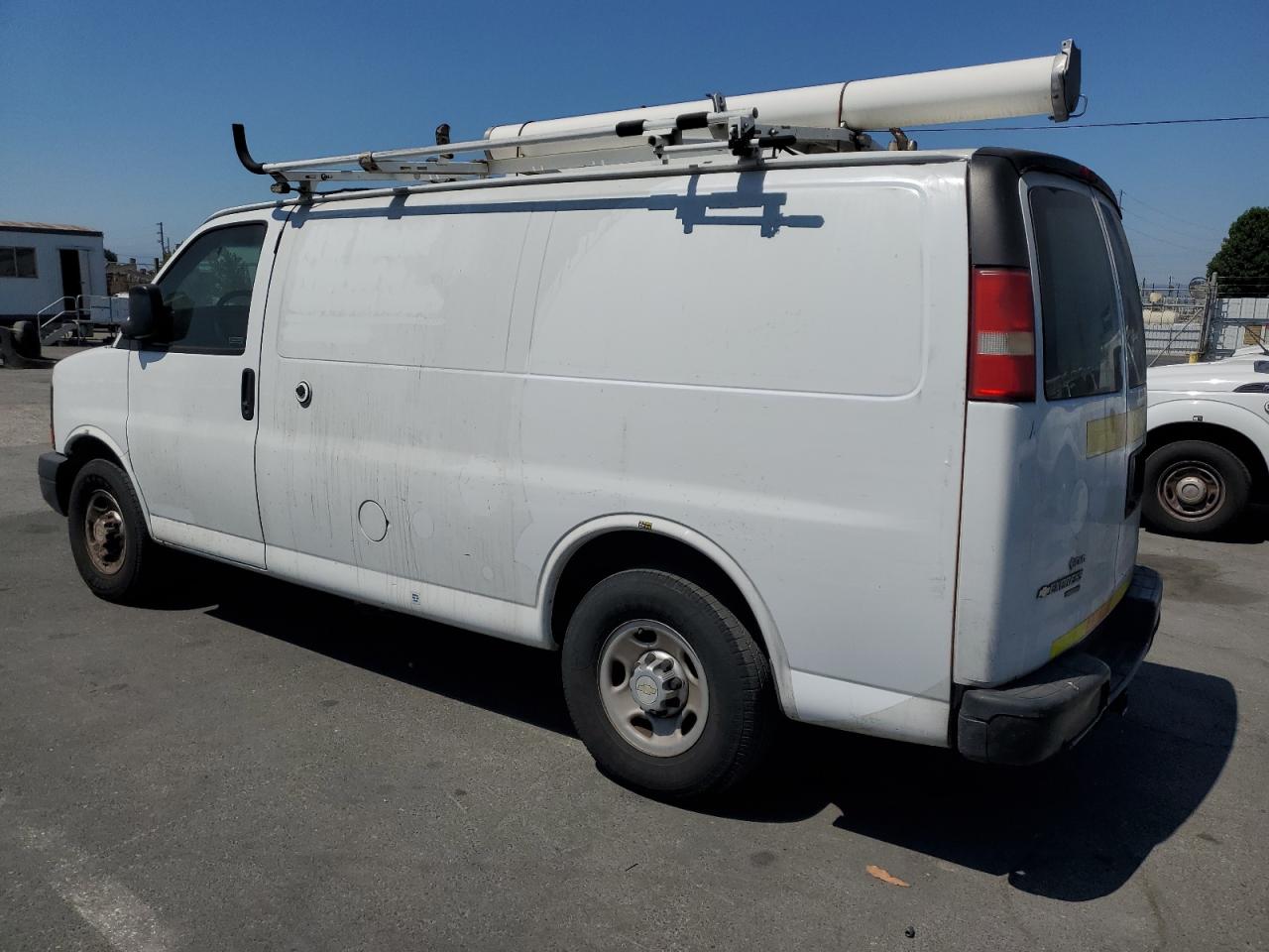 2013 Chevy Express VIN 1GCWGFCB7D1902215 photo 2