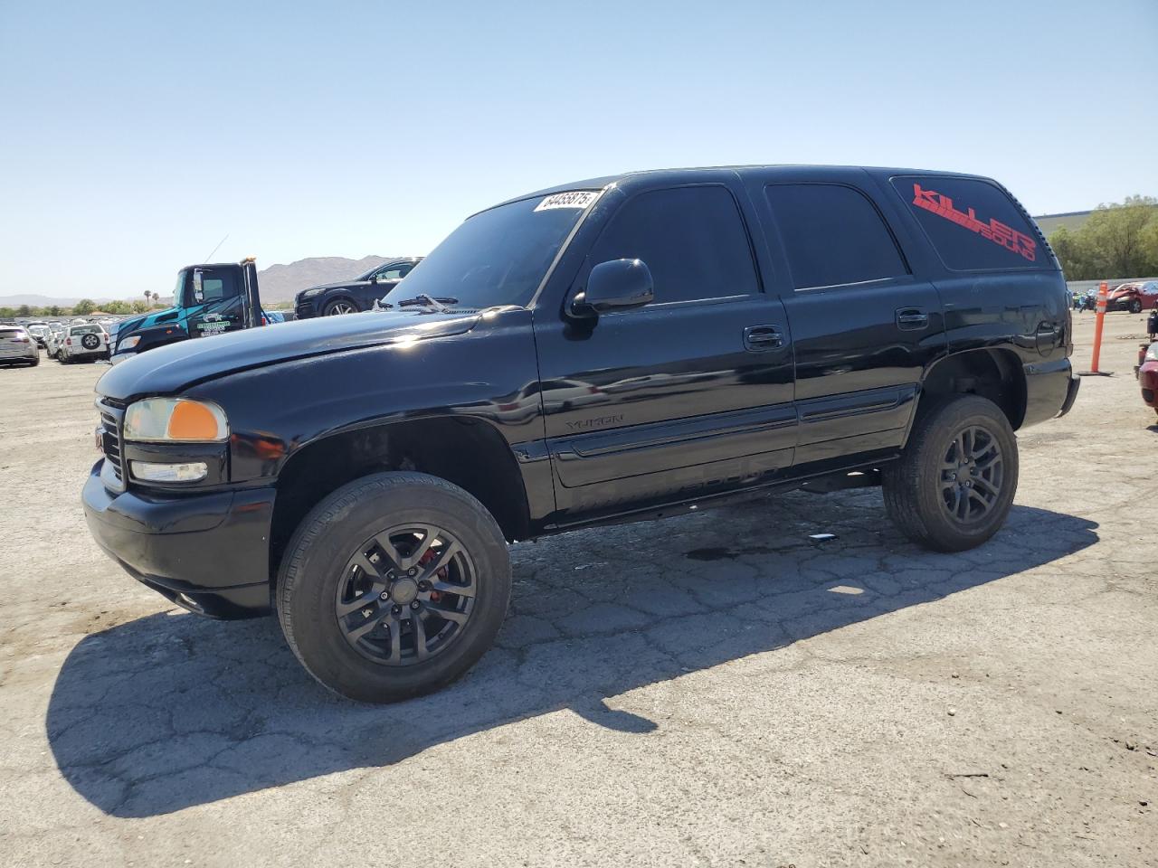 2004 GMC Yukon VIN 1GKEC13V44R246842 photo 1