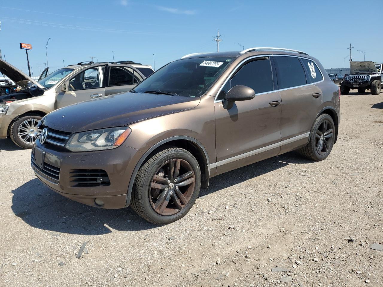 2014 Volkswagen Touareg VIN WVGEF9BP2ED011452 photo 1