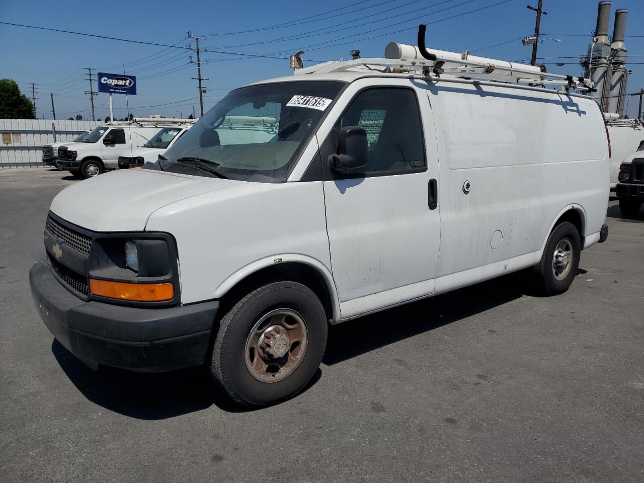 2013 Chevy Express VIN 1GCWGFCB7D1902215 photo 1
