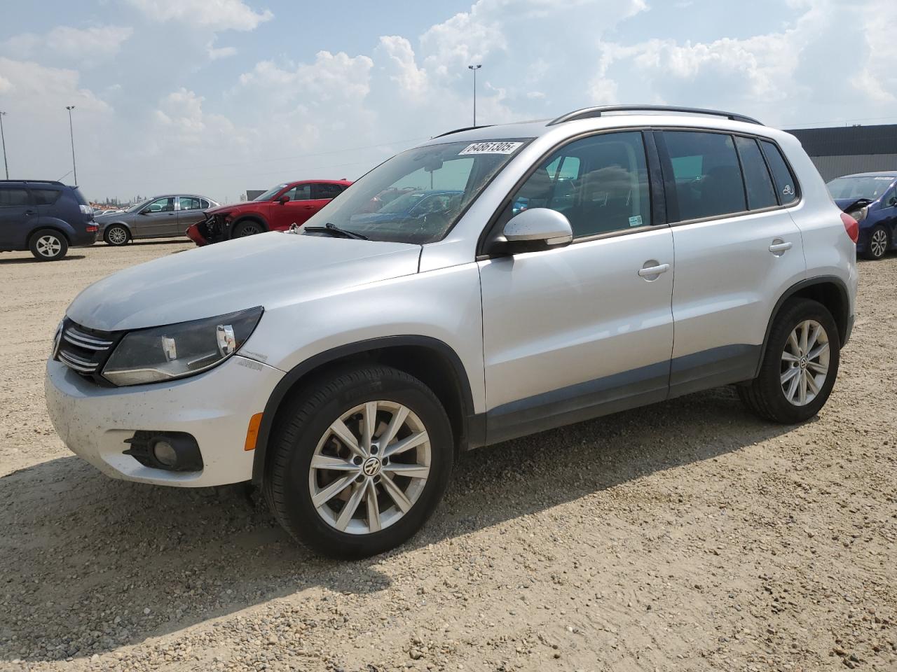 2014 VOLKSWAGEN Tiguan VIN WVGJV3AX7EW553019 photo 1