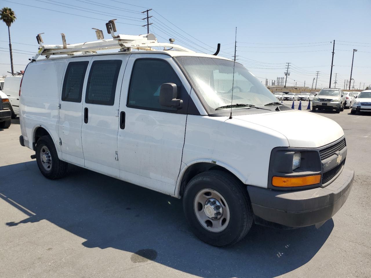 2013 Chevy Express VIN 1GCWGFCB7D1902215 photo 4