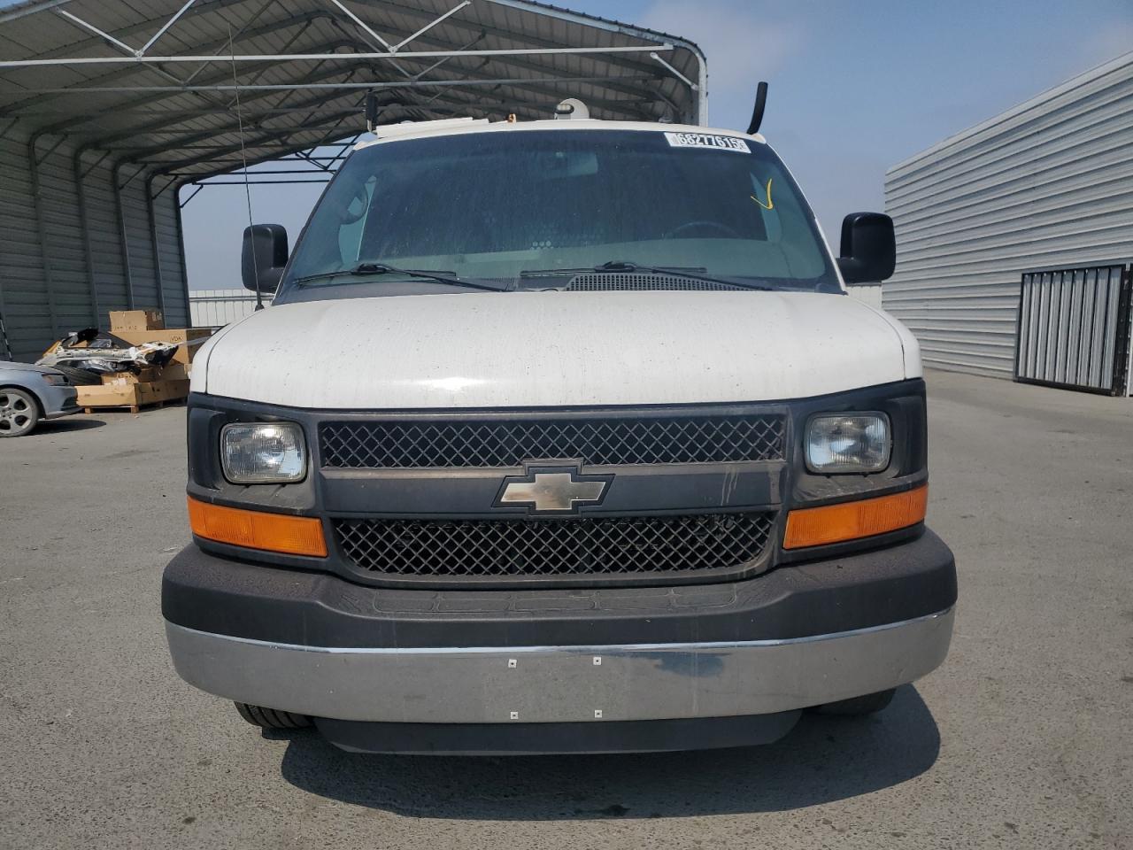 2014 Chevrolet Express VIN 1GCWGFCB7E1113614 photo 5