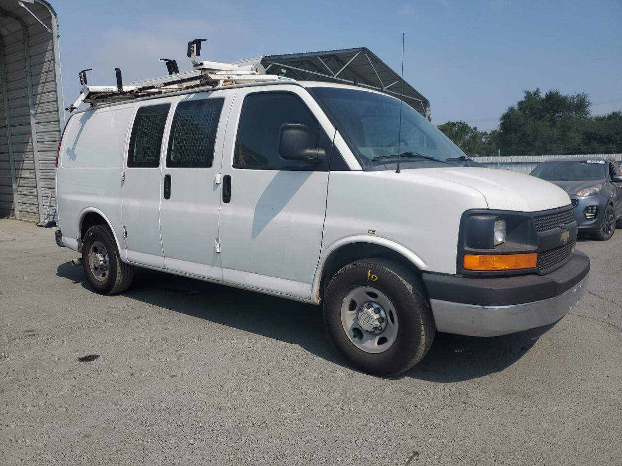 2014 Chevrolet Express VIN 1GCWGFCB7E1113614 photo 4