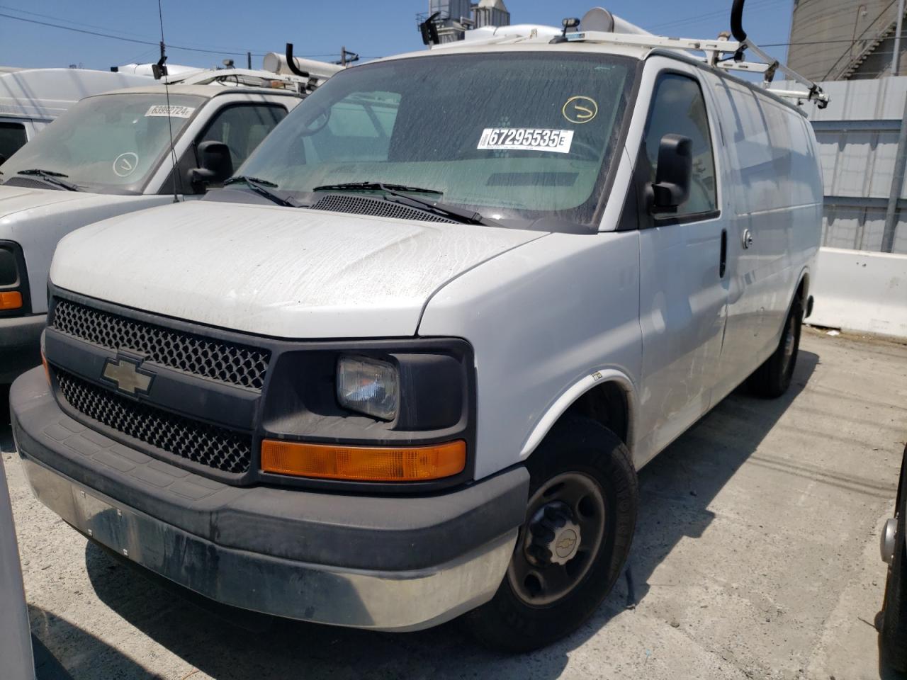 2014 Chev Express VIN 1GCWGFCB5E1133683 photo 1
