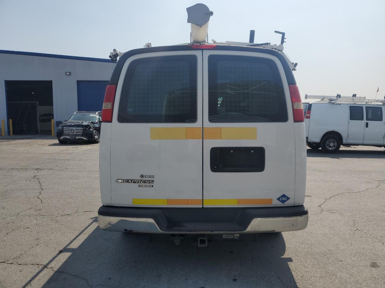 2014 Chevrolet Express VIN 1GCWGFCB7E1113614 photo 6