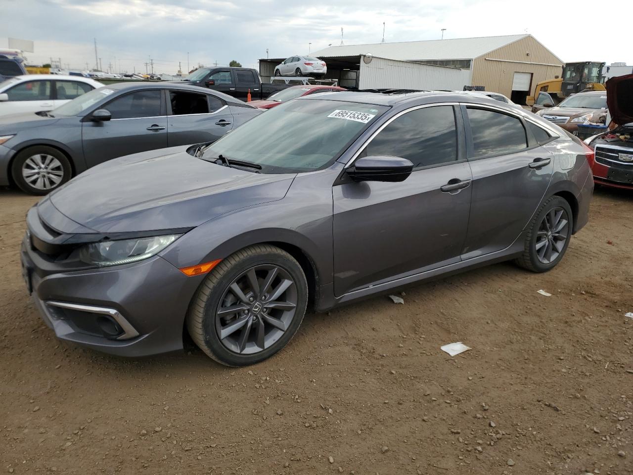 2019 Honda Civic VIN 19XFC1F34KE004653 photo 1