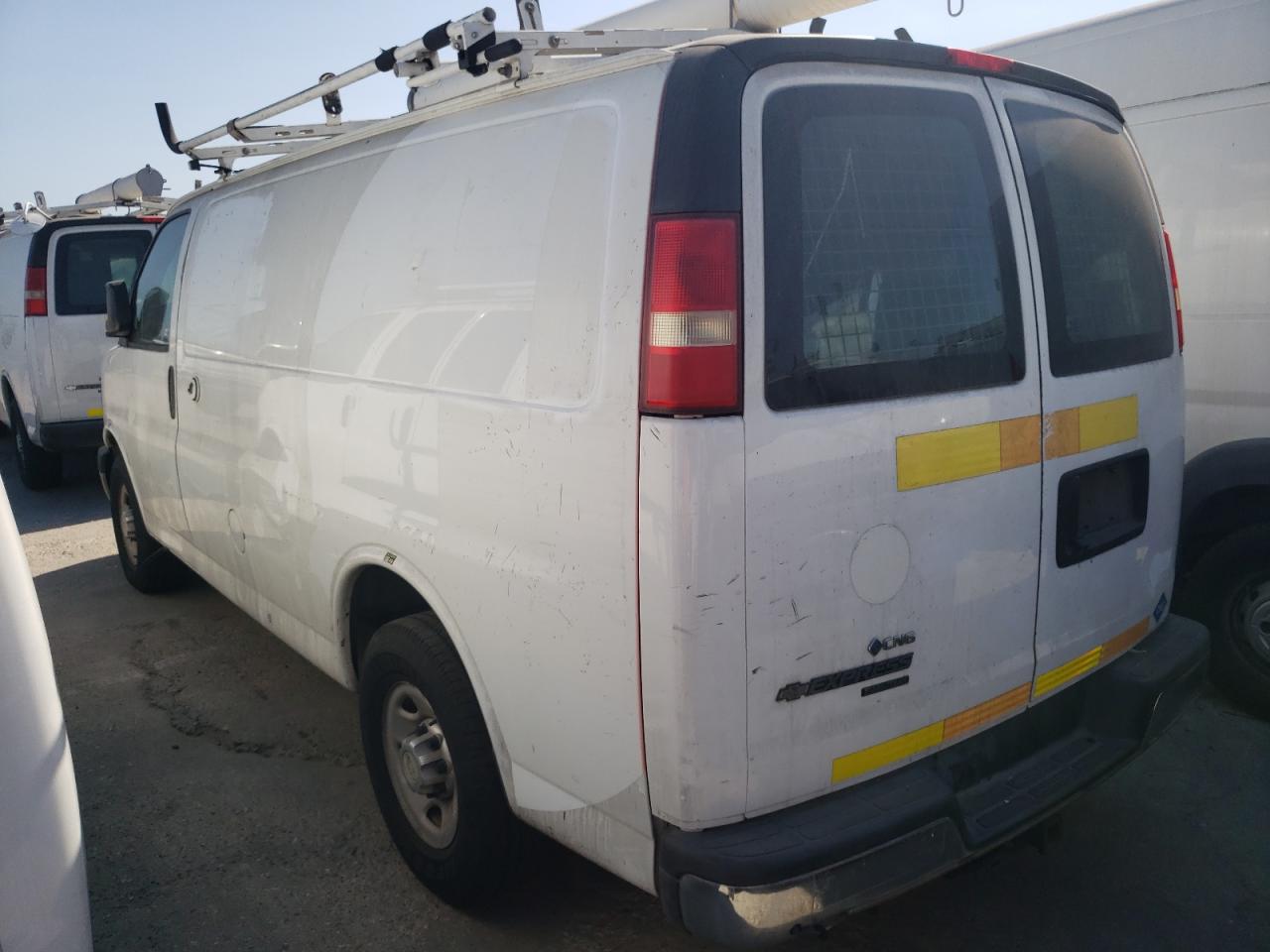 2014 Chevy Express VIN 1GCWGFCB8E1134021 photo 2