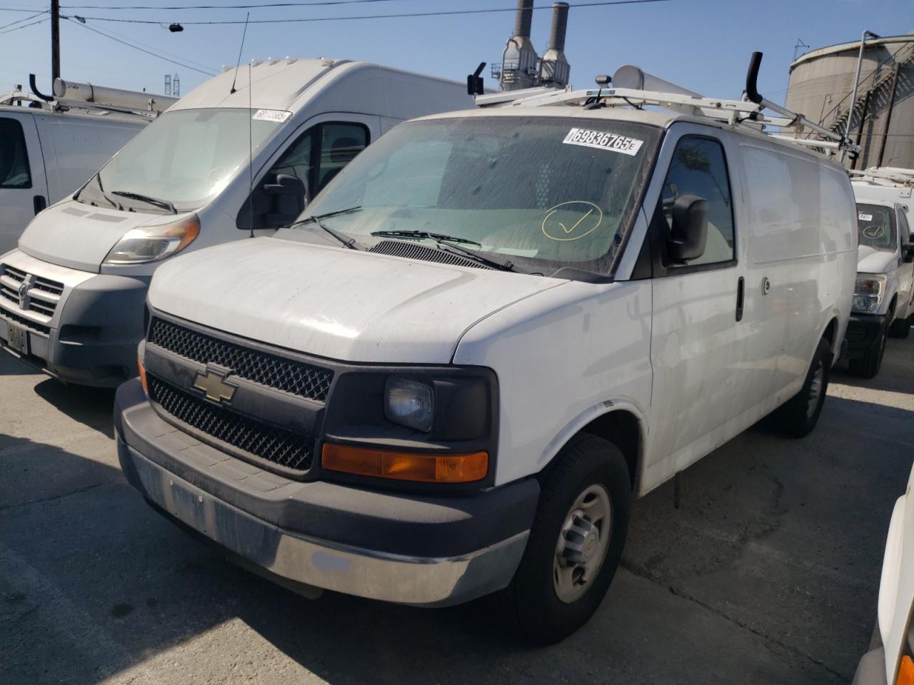 2014 Chevy Express VIN 1GCWGFCB8E1134021 photo 1