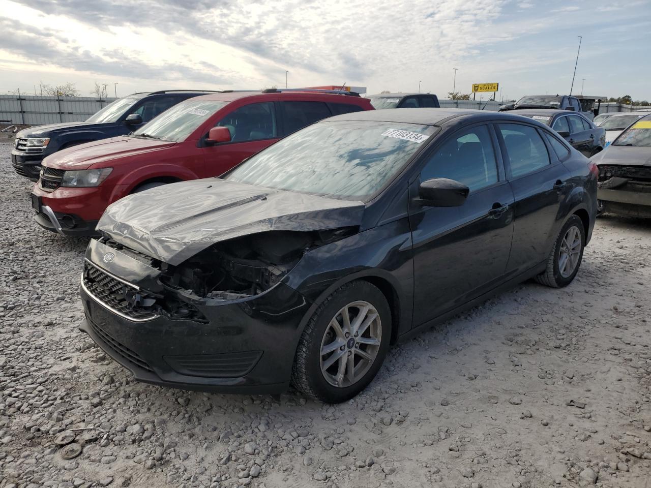 2018 Ford Focus VIN 1FADP3FE0JL229964 photo 1