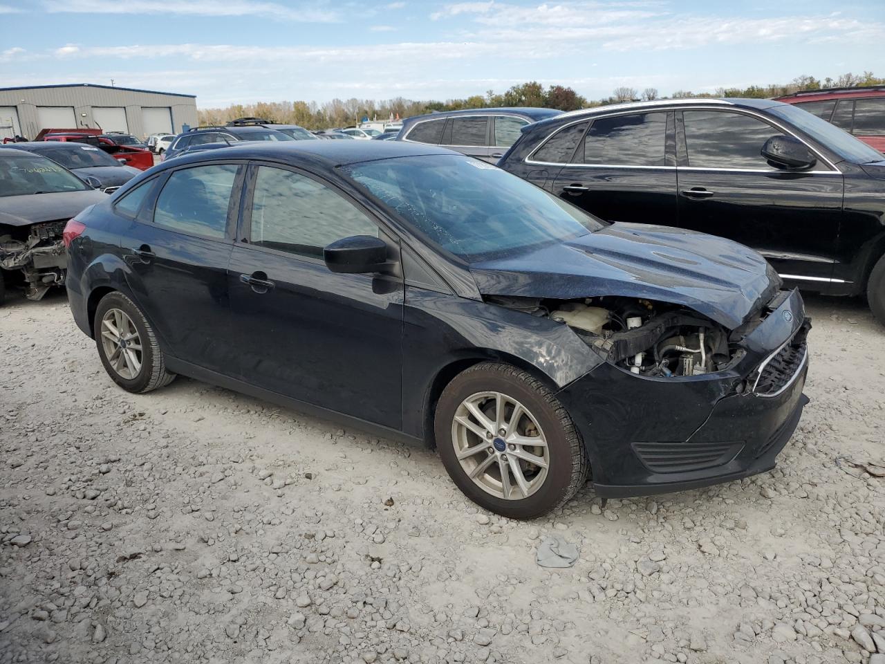 2018 Ford Focus VIN 1FADP3FE0JL229964 photo 4