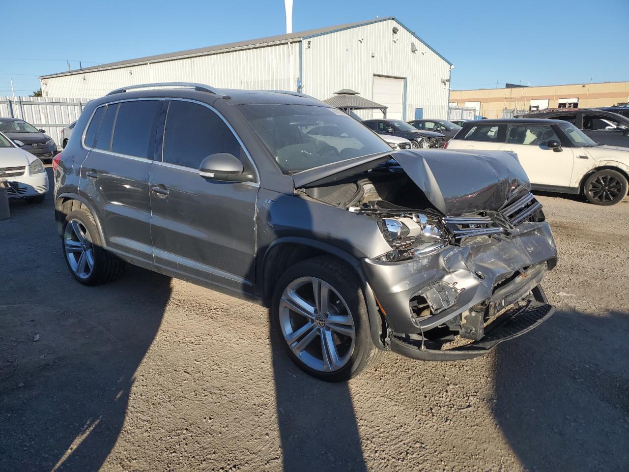 2014 VOLKSWAGEN Tiguan VIN WVGJV3AX0EW026391 photo 4