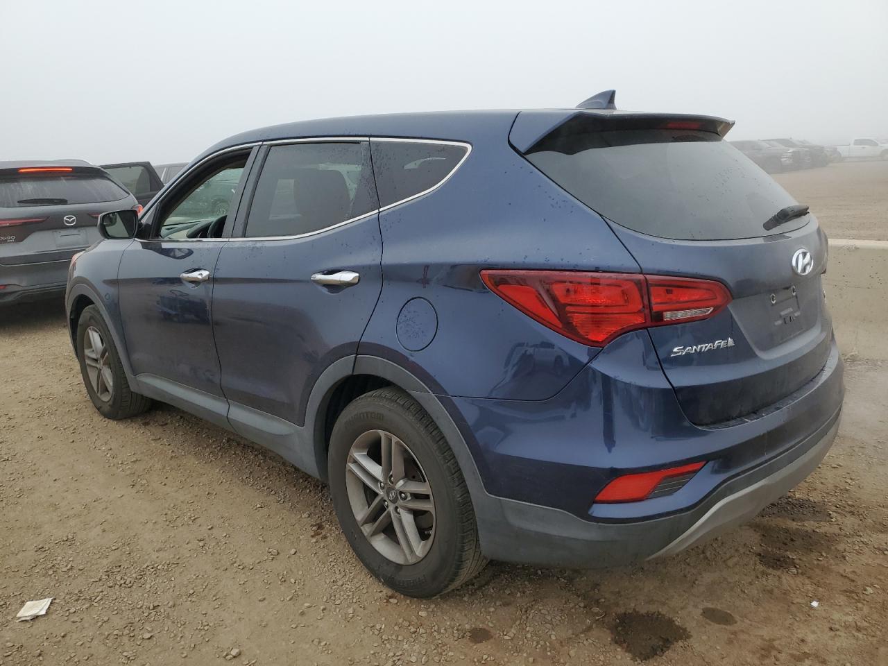 2017 Hyundai Santa fe VIN 5XYZTDLB6HG466394 photo 2