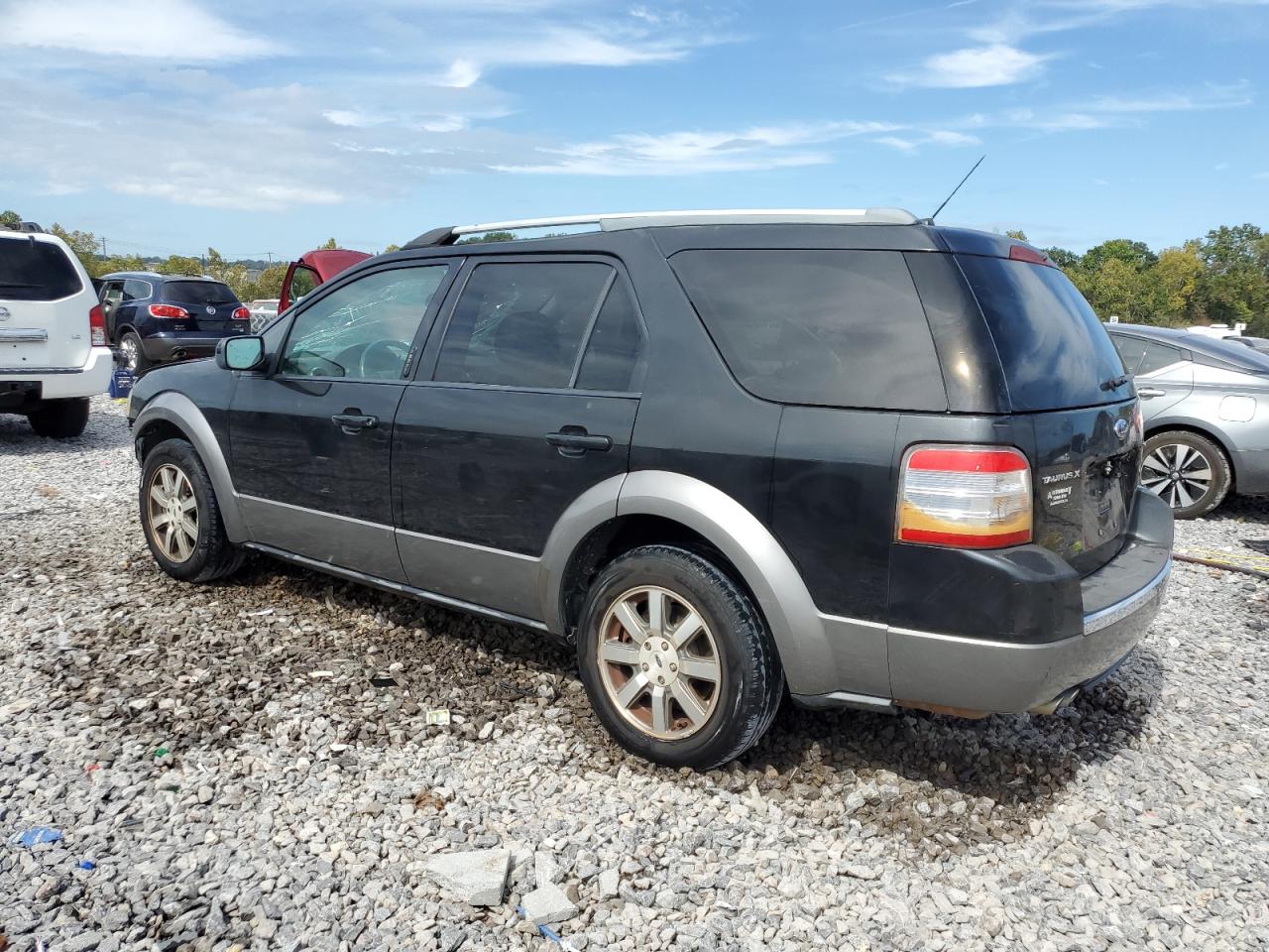 2009 Ford Taurus VIN 1FMDK02W29GA03382 photo 2
