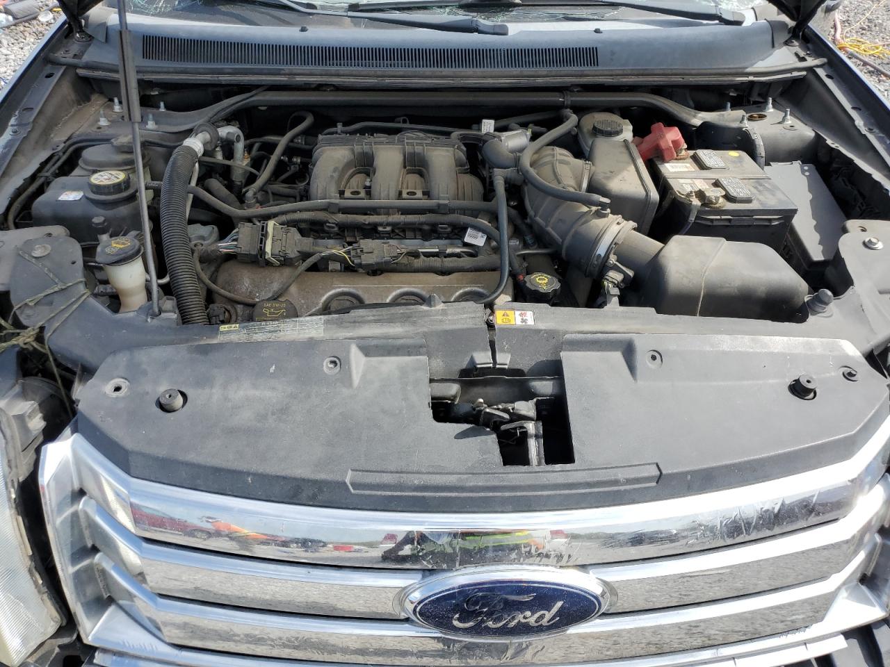2009 Ford Taurus VIN 1FMDK02W29GA03382 photo 12
