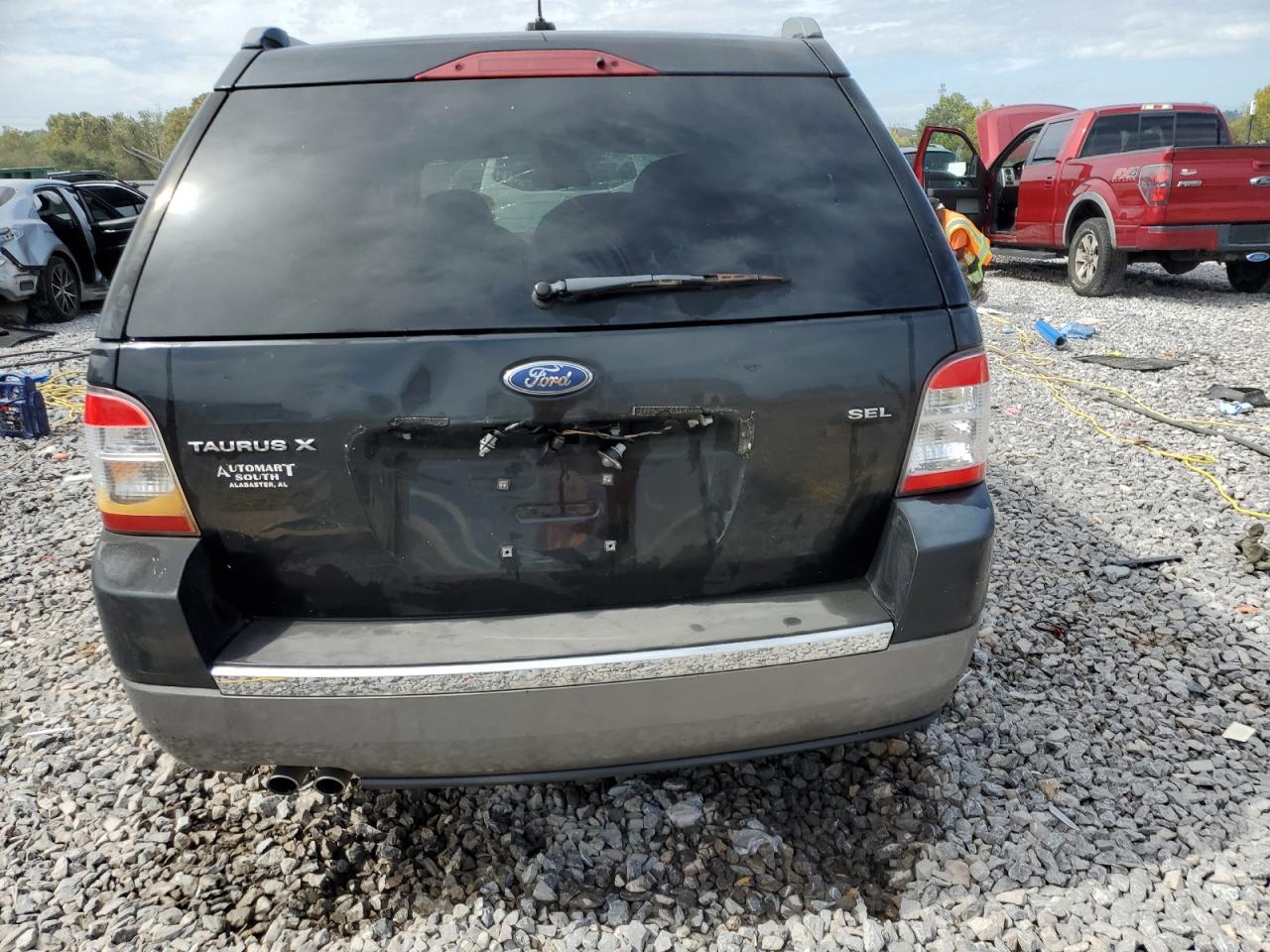 2009 Ford Taurus VIN 1FMDK02W29GA03382 photo 6