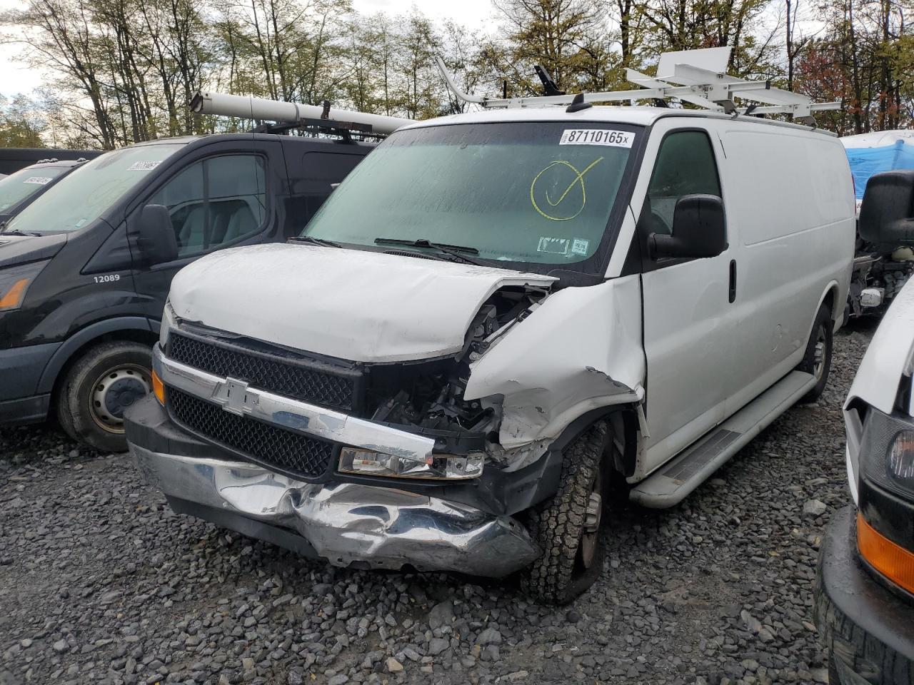 2021 Chevrolet Express VIN 1GCWGAF77M1309822 photo 1