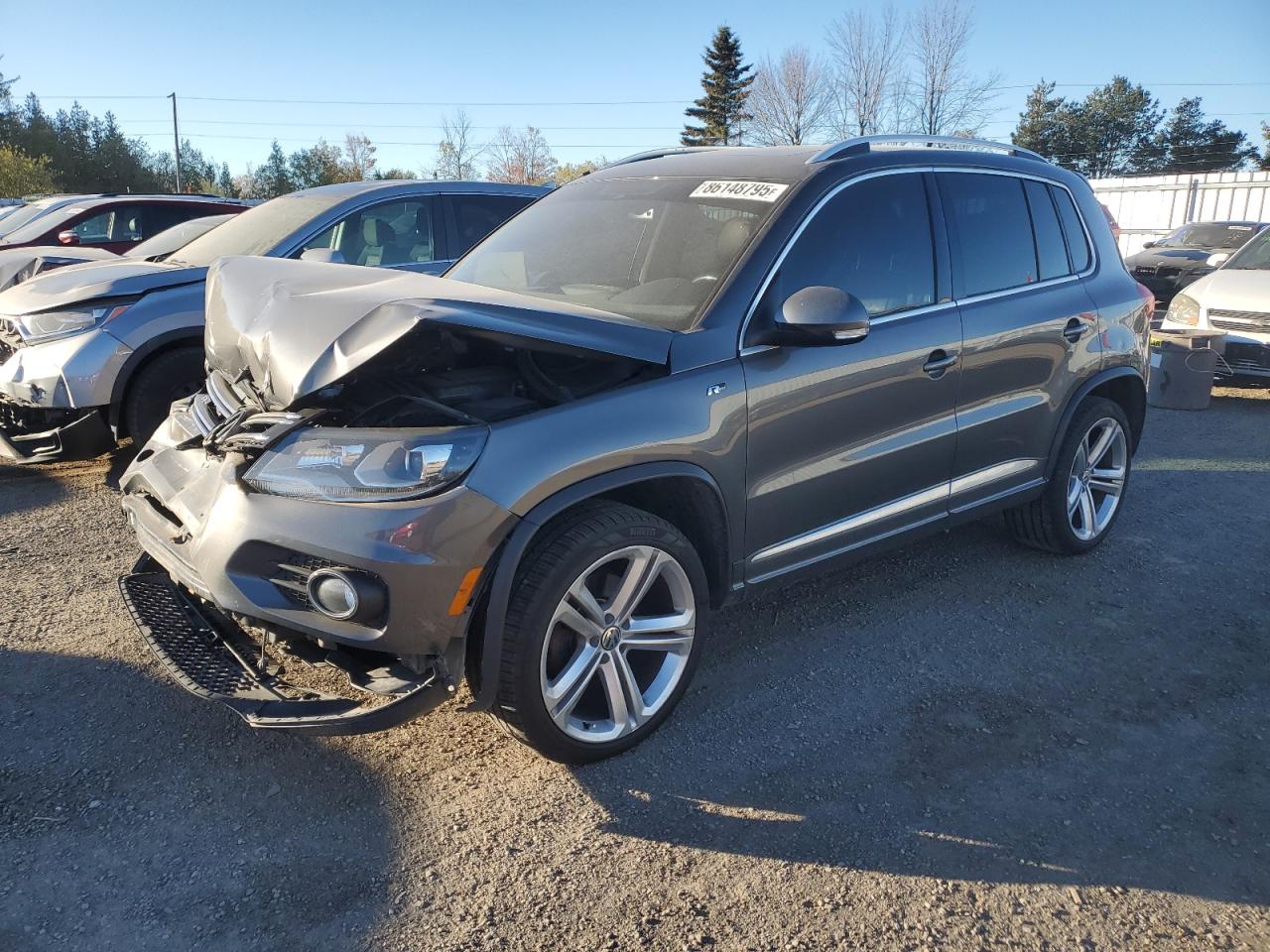 2014 VOLKSWAGEN Tiguan VIN WVGJV3AX0EW026391 photo 1