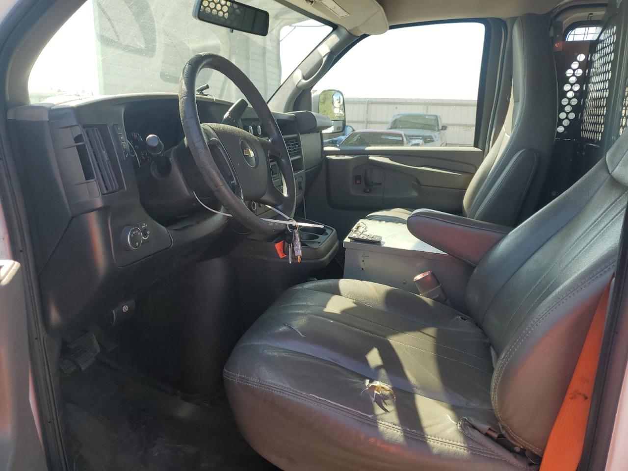 2014 Chevrolet Express VIN 1GCWGFCB2E1118218 photo 7