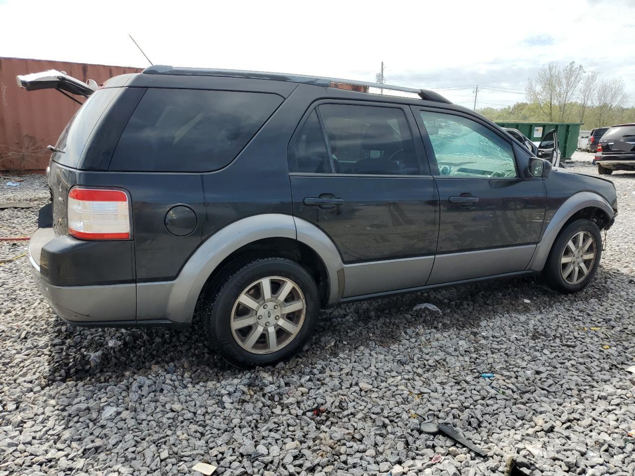 2009 Ford Taurus VIN 1FMDK02W29GA03382 photo 3