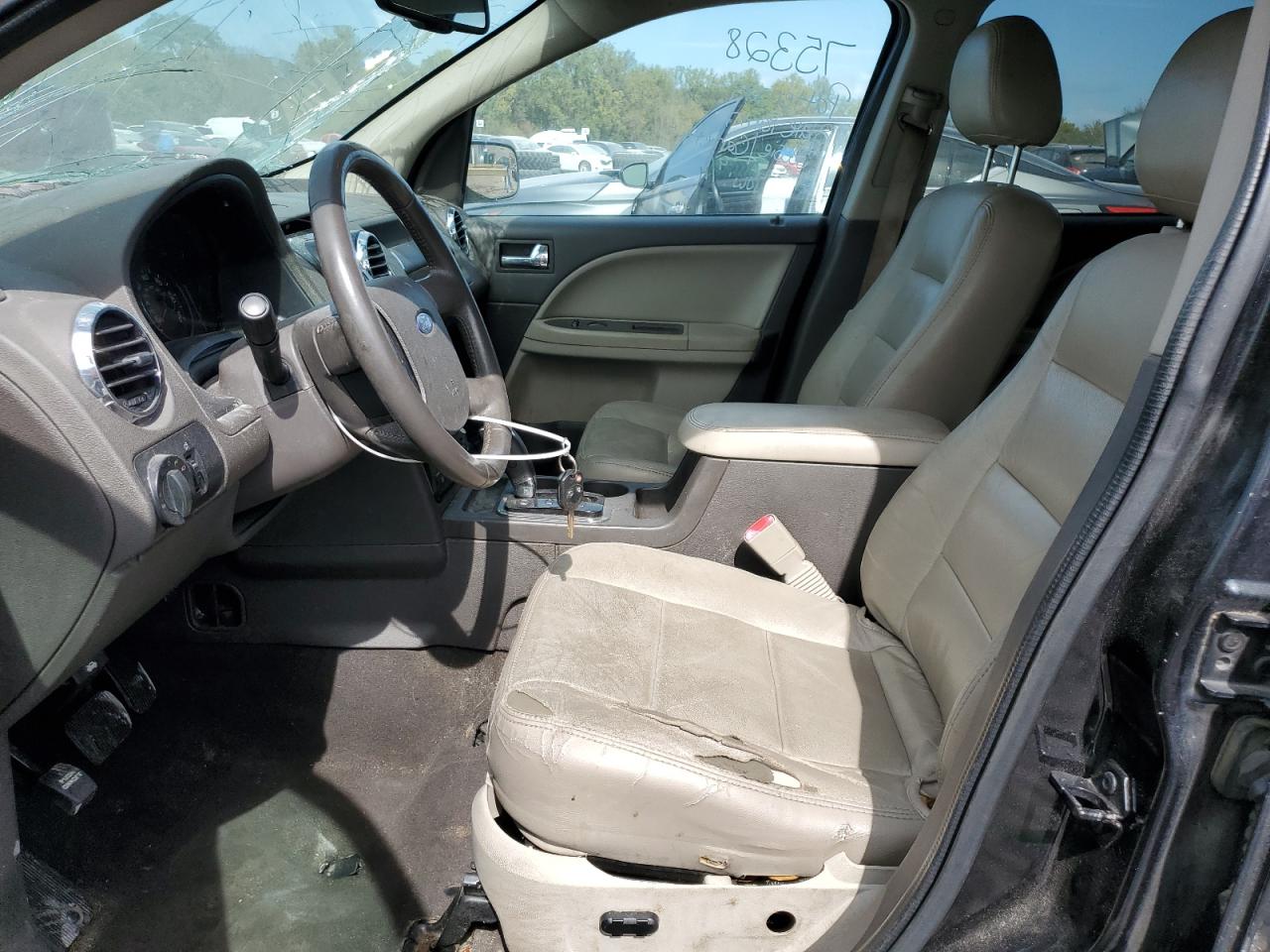 2009 Ford Taurus VIN 1FMDK02W29GA03382 photo 7