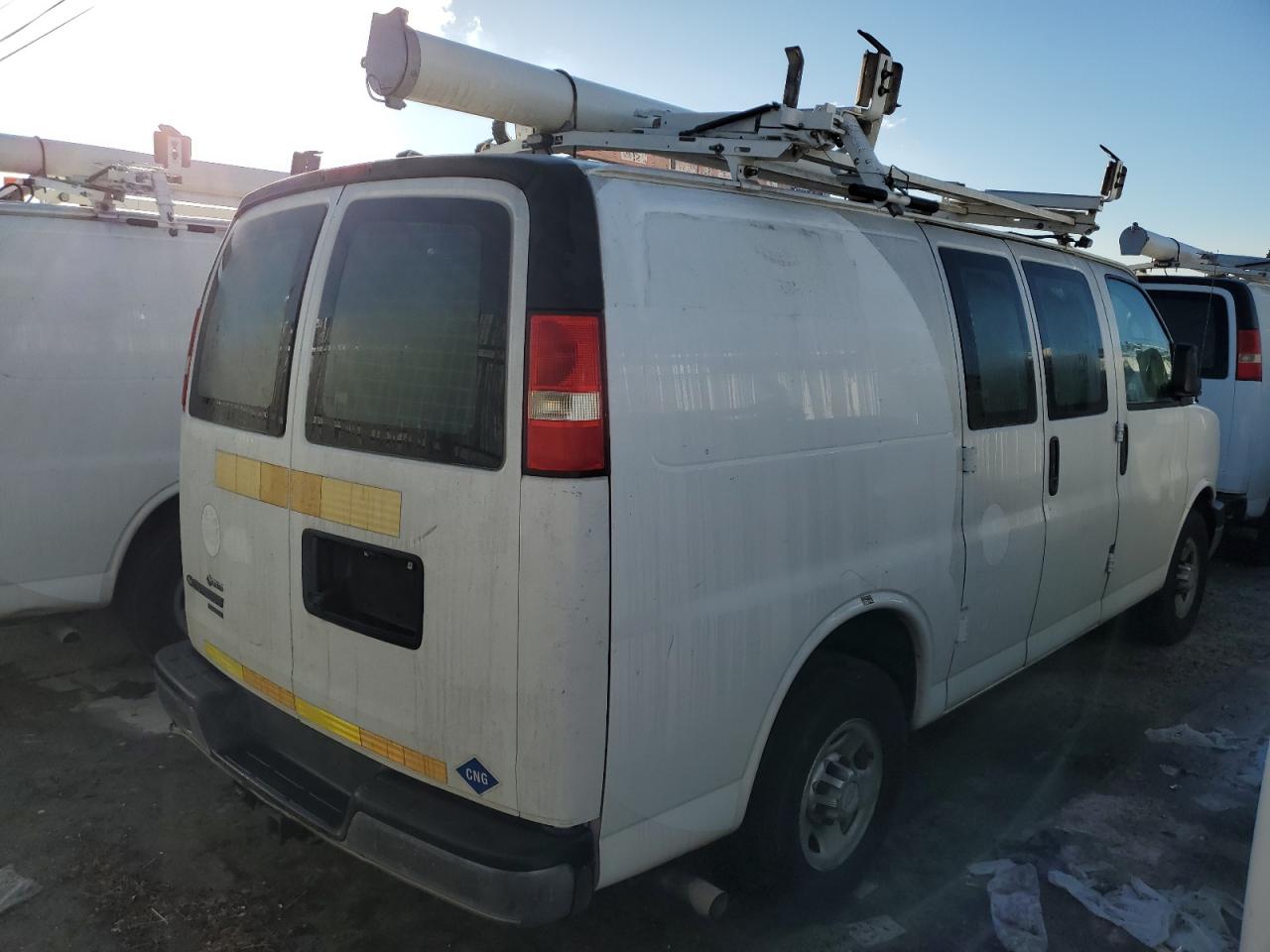 2014 CHEV Express VIN 1GCWGFCB4E1134694 photo 3