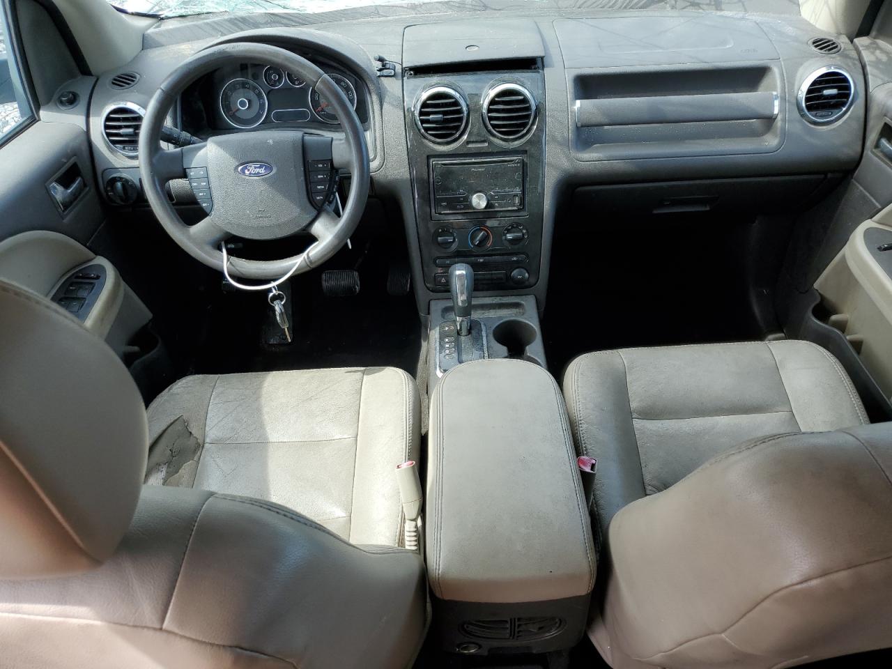 2009 Ford Taurus VIN 1FMDK02W29GA03382 photo 8