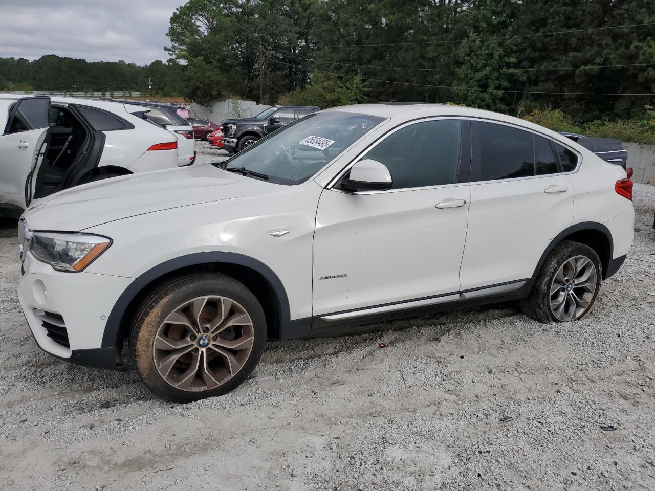2018 BMW X4 VIN 5UXXW3C55J0Z60730 photo 1