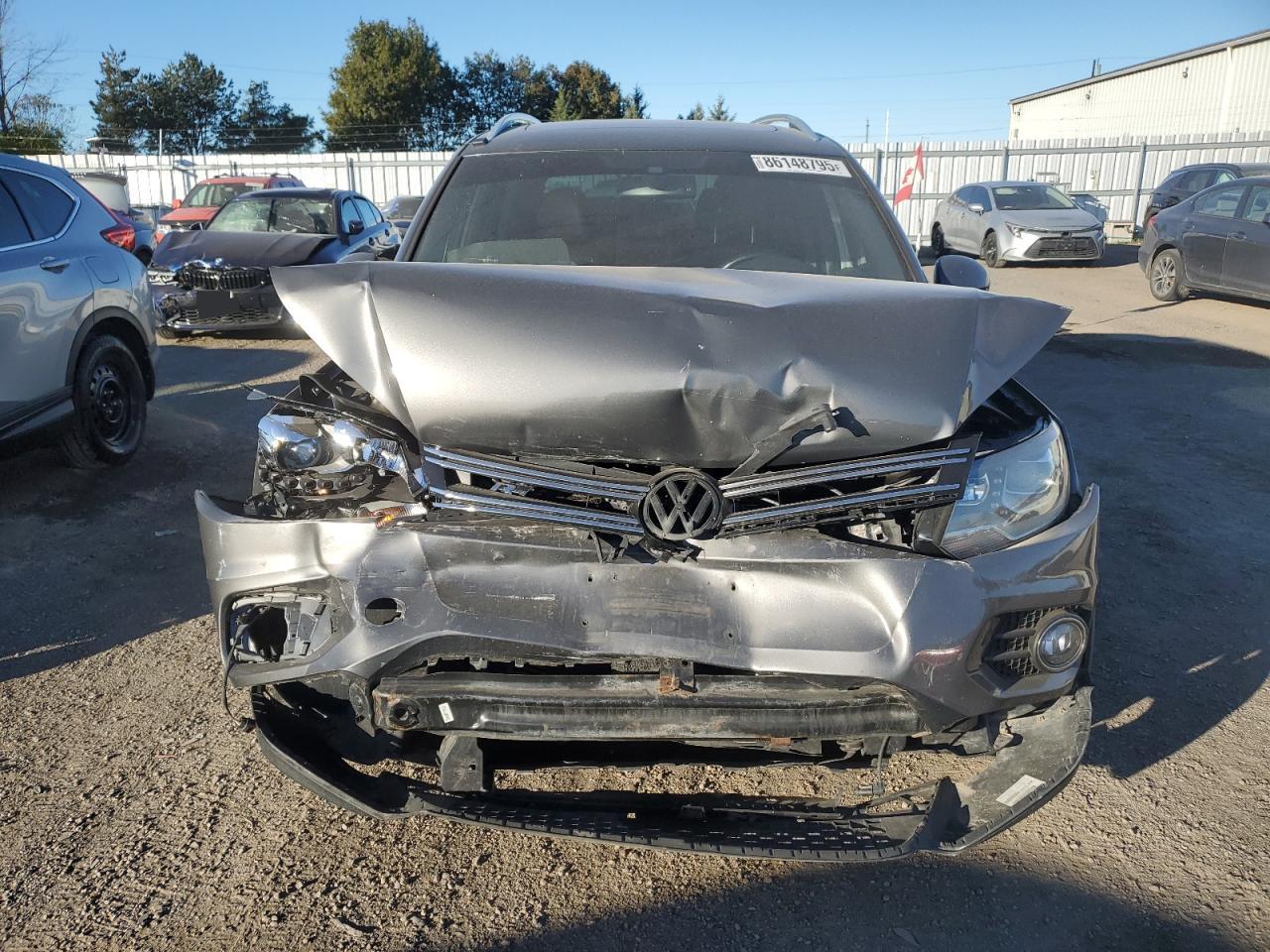 2014 VOLKSWAGEN Tiguan VIN WVGJV3AX0EW026391 photo 5