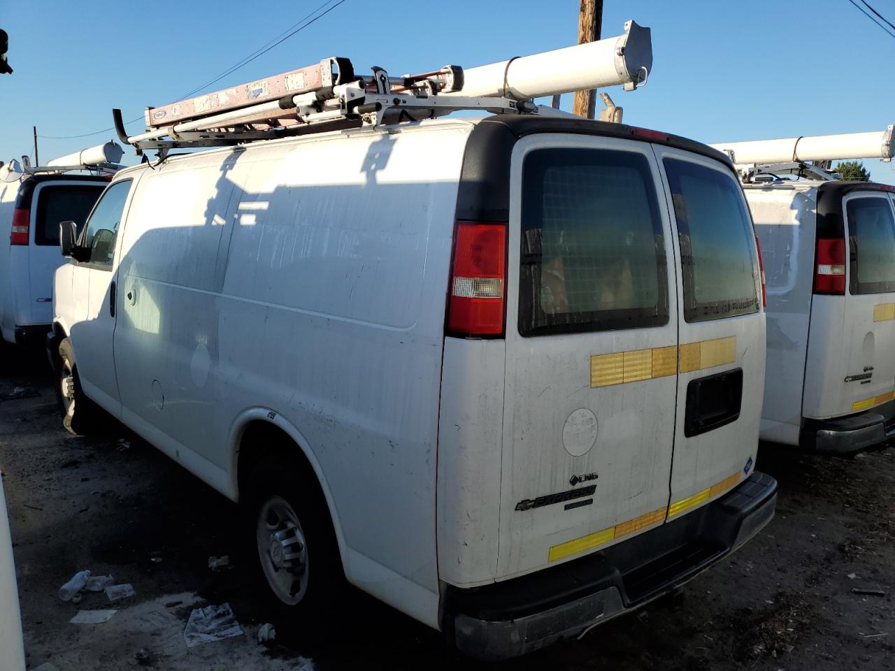 2014 CHEV Express VIN 1GCWGFCB4E1134694 photo 2