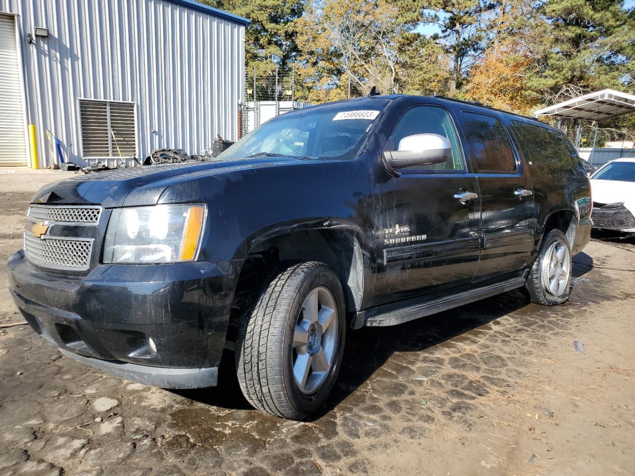 2014 Chevrolet Suburban VIN 1GNSCJE01ER139059 photo 1