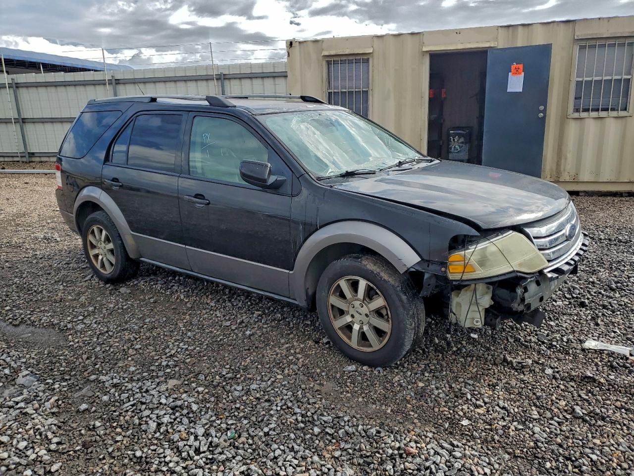 2009 Ford Taurus VIN 1FMDK02W29GA03382 photo 4
