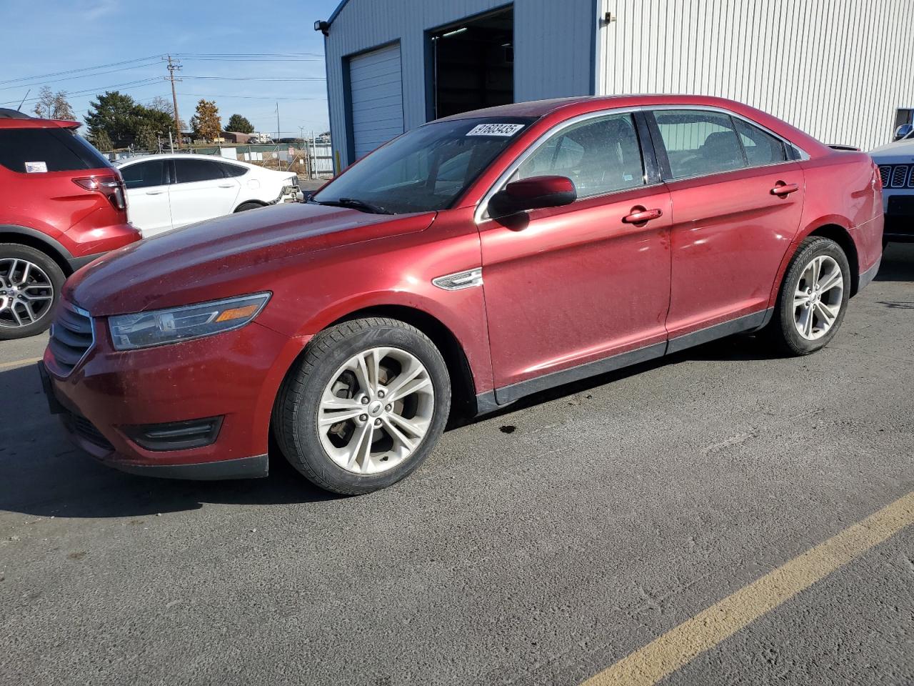 2015 Ford Taurus VIN 1FAHP2E82FG172982 photo 1