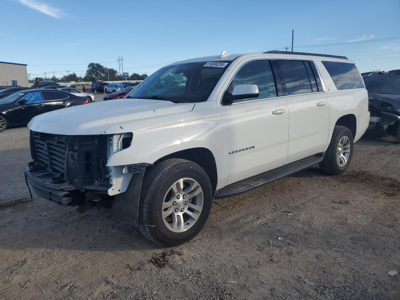 2017 Chevrolet Suburban VIN 1GNSCHKC9HR135854 photo 1