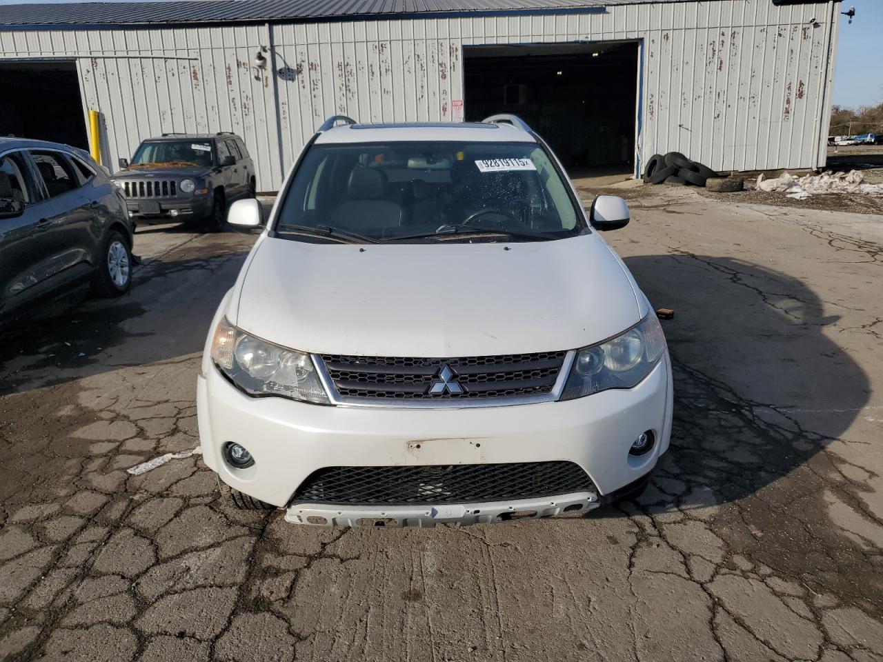 2009 Mitsubishi Outlander VIN JA4LT31W29Z010606 photo 5