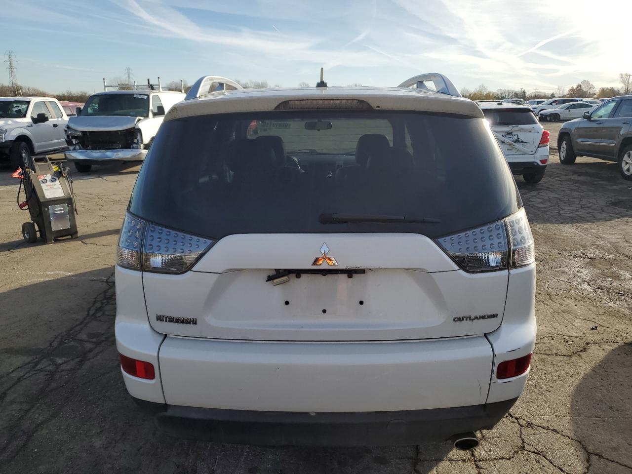 2009 Mitsubishi Outlander VIN JA4LT31W29Z010606 photo 6