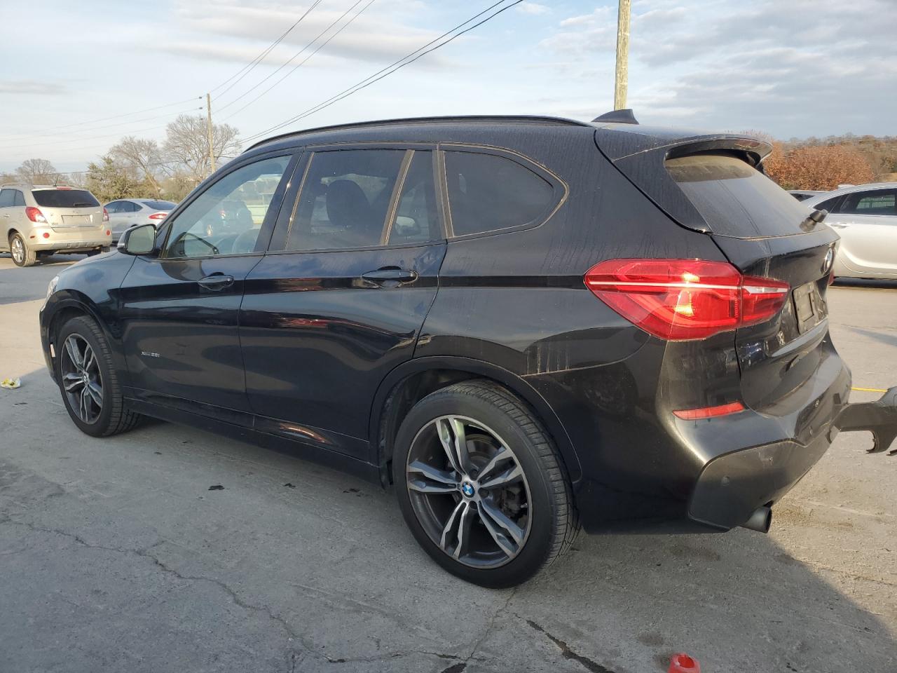2017 BMW X1 VIN WBXHT3C31H5F72345 photo 2