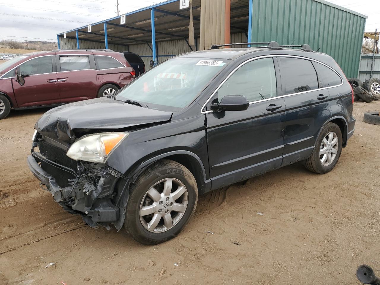 2009 Honda Crv VIN JHLRE48709C004629 photo 1